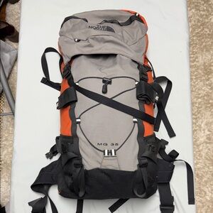 The North Face MG 35 Backpack in Gray and Orange